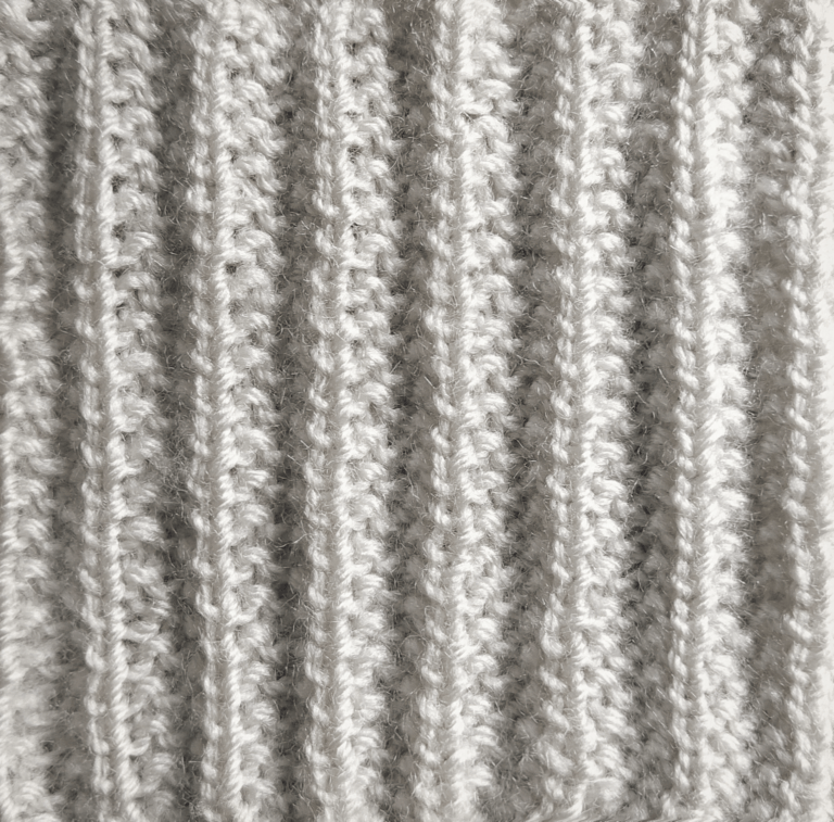 A close up view of the no-purl knitting stitch. Knit by KnitQ.