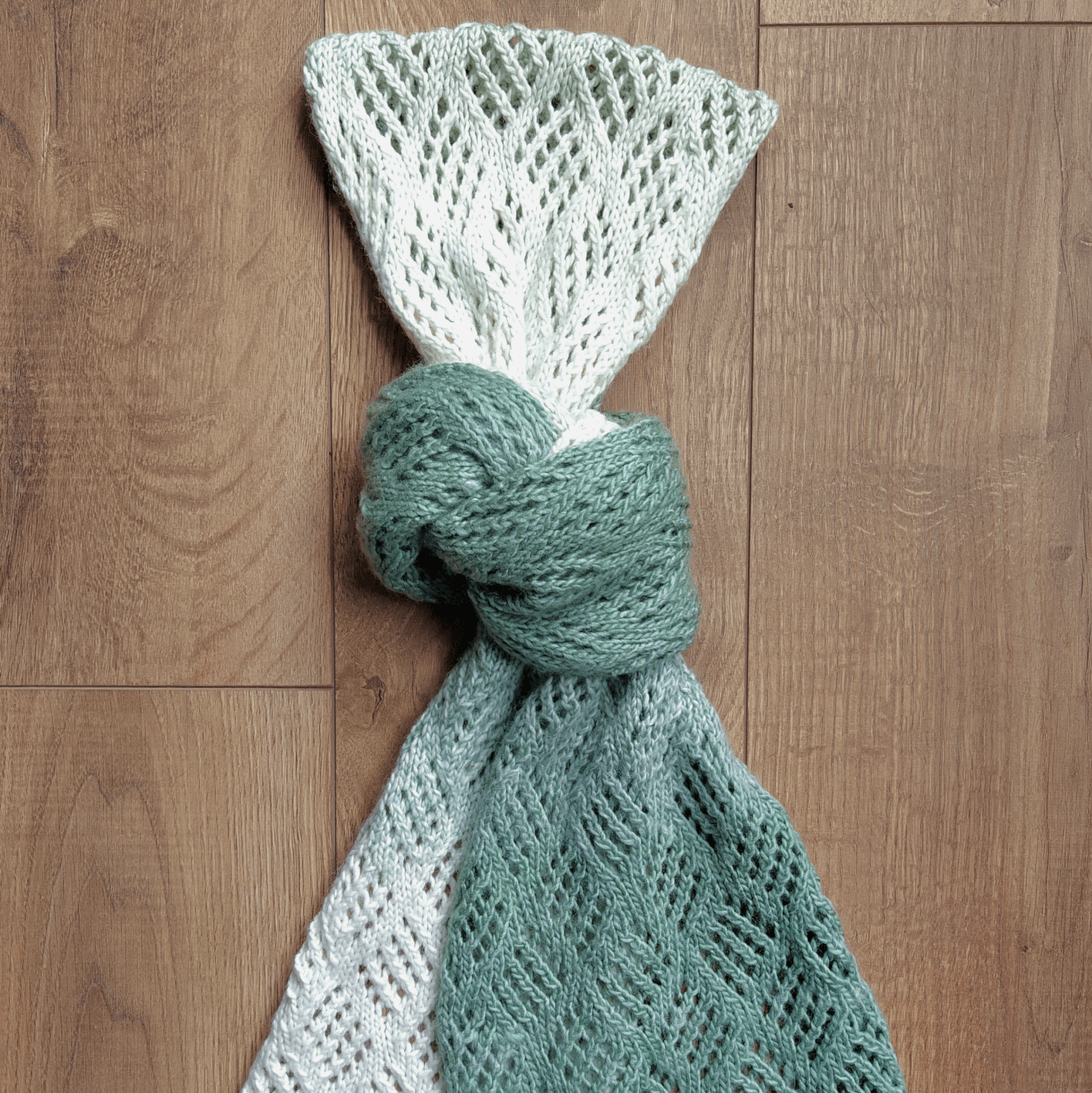 Checkerboard lace scarf by Purl Soho. Knit by Knitq.