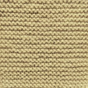 Close up of a garter stitch knitting swatch. Knit by KnitQ.