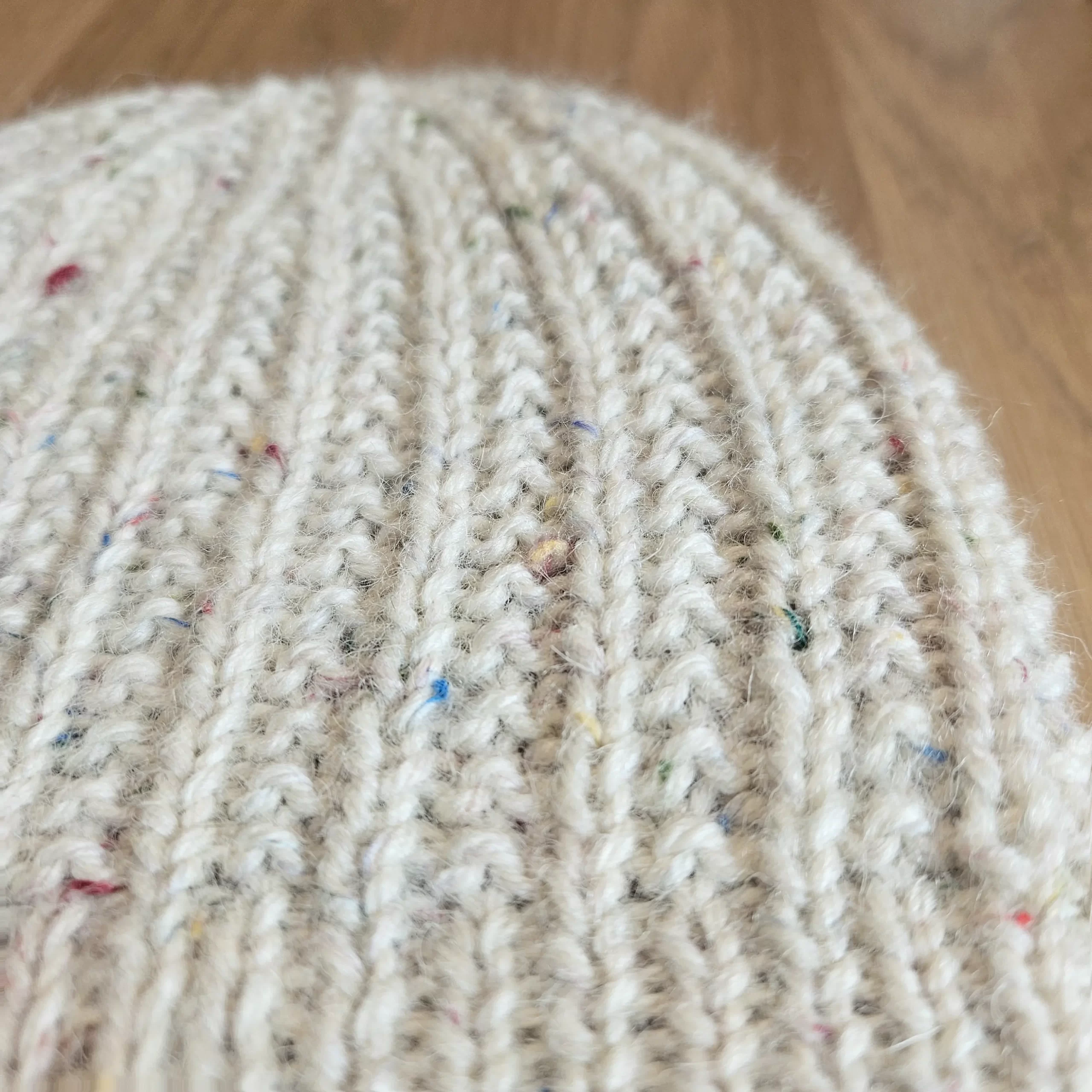 A close up of the beaded rib stitch used in the beaded rib beanie