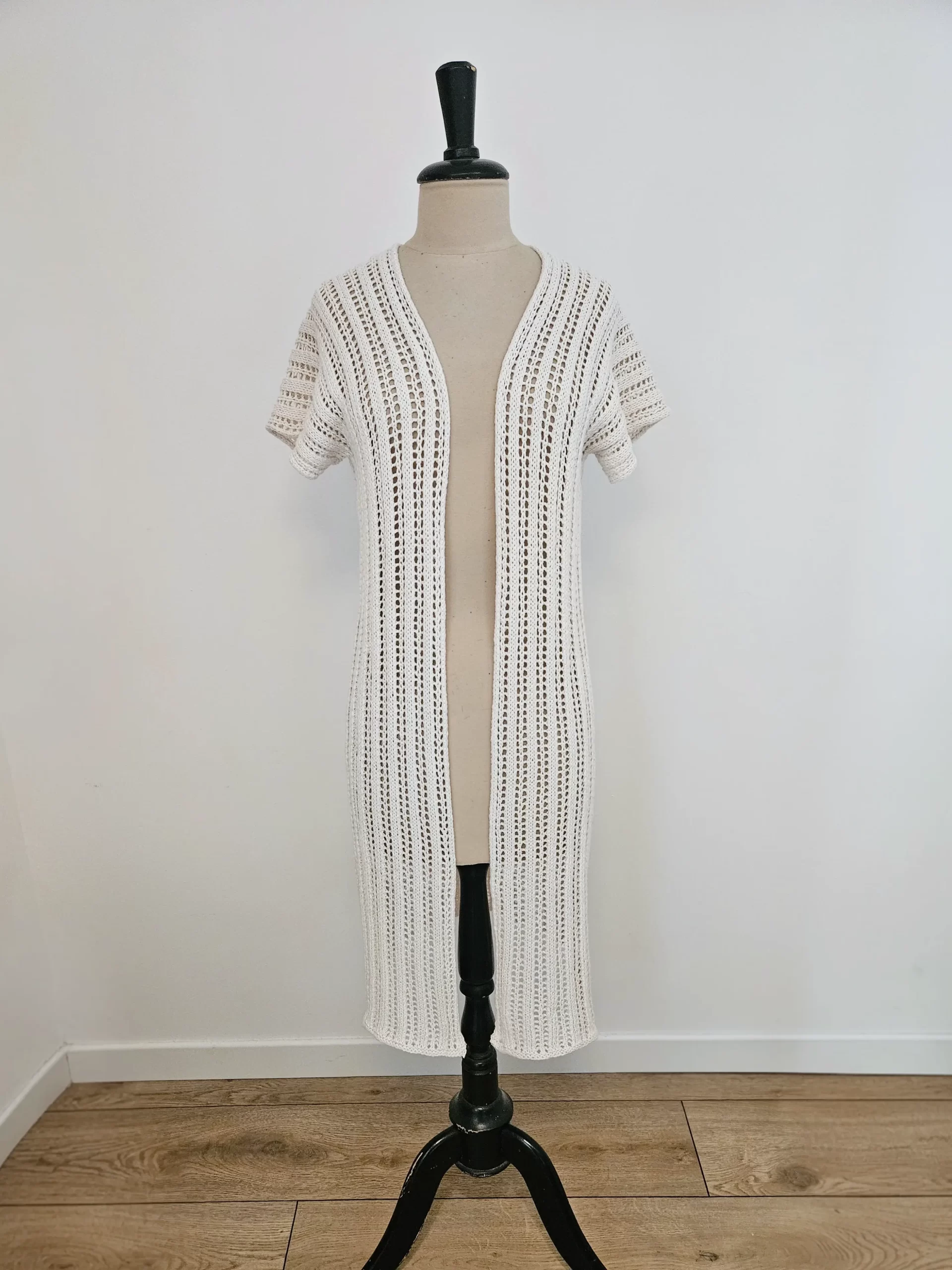 The reya swuimsuit cover up from the front being displayed on a mannequin